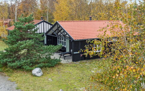 Gudrund - 250M from the Sea: Roof, House, Home, Cottage, Door, Siding, Deck, Porch, Plank, Hardwood