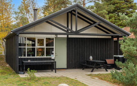 Gudrund - 250M from the Sea: Roof, House, Home, Cottage, Door, Siding, Deck, Porch, Plank, Hardwood