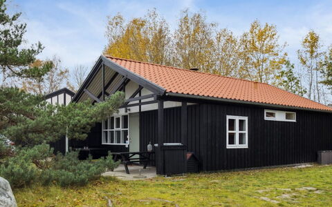 Gudrund - 250M from the Sea: Roof, House, Home, Cottage, Door, Siding, Deck, Porch, Plank, Hardwood