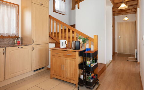 Orchidée: Furniture, Flooring, Wood, Interior Design, Floor, Cabinetry, Ceiling, Kitchen, Room, Lighting