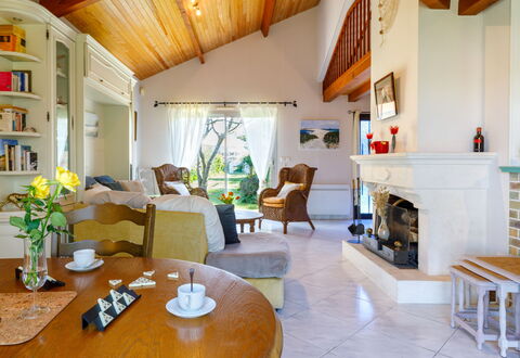 L'Oiseau Bleu: Furniture, Interior Design, Couch, Flooring, Ceiling, Wood, Living Room, Chair, Floor, Room