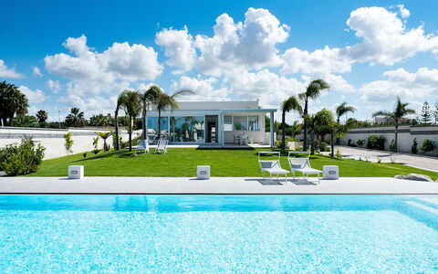 Casa Biancoverde - Marsala, Sicilia: Cloud, Sky, Water, Plant, Property, Nature, Tree, Swimming Pool, Building, Grass
