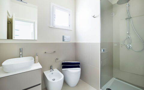 Mariposa - Fontane Bianche, Sicilia: Plumbing Fixture, Property, Bathroom, Window, Mirror, Shower Head, Purple, Sink, Interior Design