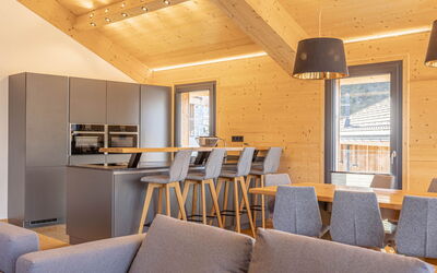 Superior # 22 mit Sauna & Hot Tub 160.14: Furniture, Property, Chair, Interior Design, Architecture, Wood, Floor, Wall, Flooring, Living Room