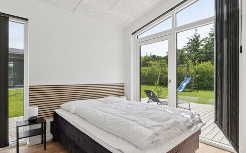 Nissine - 300M from the Sea: Ceiling, Bedroom, Bed, Hardwood, Design, Plank, Daylighting, Bed Frame, Bedding, Wood Flooring