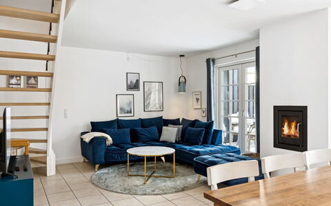Tian: Furniture, Interior Design, Flooring, Couch, Floor, Living Room, Wood, Room, Wood Flooring, Apartment