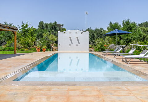 Villa Del Capitolo Con Trullo: Water, Sky, Swimming Pool, Plant, Tree, Building, Shade, Composite Material, Leisure, Landscape