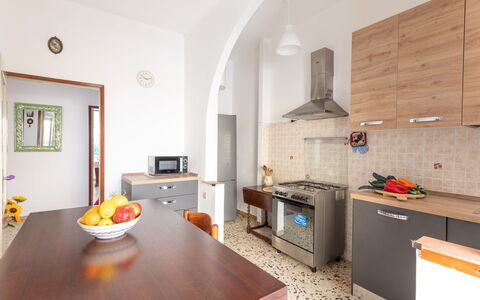 Angela: Cabinetry, Property, Countertop, Table, Wood, Flooring, Kitchen, Interior Design, Floor, Kitchen Stove