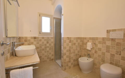 Villa Helios - Budoni, Sardegna: Sink, Mirror, Bathroom, Plumbing Fixture, Purple, Bathroom Sink, Floor, Flooring, Tap