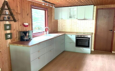 Friis - 100M from the Sea: Flooring, Wood, Kitchen, Floor, Countertop, Wood Flooring, Furniture, Interior Design, Cabinetry, Kitchen Appliance
