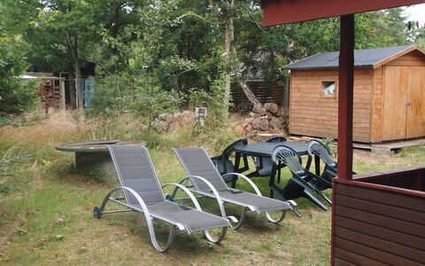 Friis - 100M from the Sea: Wood, Furniture, Outdoor Furniture, Garden, Backyard, Chair, Yard, Outdoor Table, Lawn, Shade