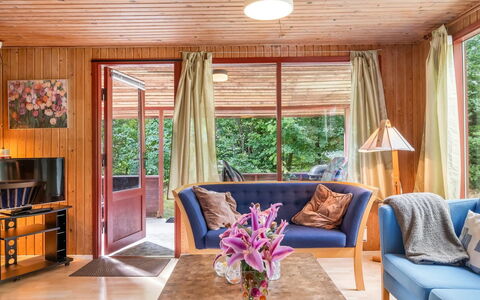 Friis - 100M from the Sea: Furniture, Interior Design, Flooring, Wood, Couch, Floor, Ceiling, Room, Living Room, Lighting