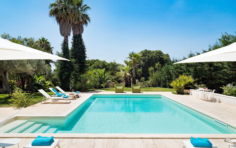 Casa Fiore - Salemi, Sicilia: Water, Plant, Property, Sky, Swimming Pool, Azure, Nature, Tree, Shade, Grass