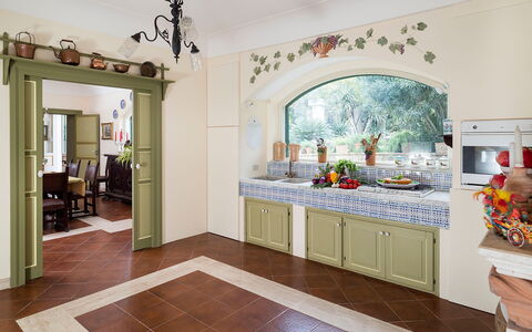 Casa Fiore - Salemi, Sicilia: Cabinetry, Countertop, Kitchen, Wood, Interior Design, Flooring, Floor, Living Room, Wall, Real Estate