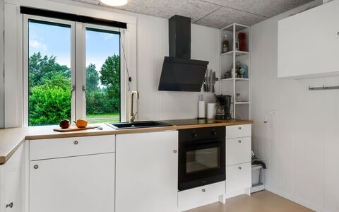 Elisa - 600M from the Sea: Kitchen, Kitchen Appliance, Countertop, Flooring, Major Appliance, Wood, Interior Design, Ceiling, Light Fixture, Cabinetry
