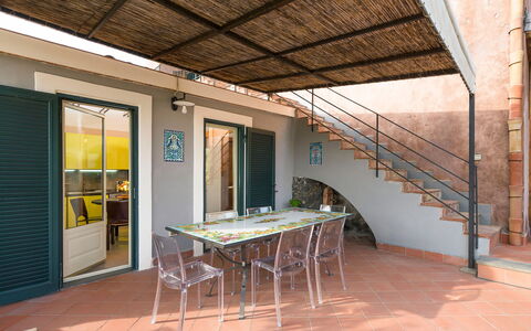Oasi Verde - Santa Maria La Stella, Sicilia: Table, Property, Furniture, Wood, Shade, Building, Interior Design, Flooring, Porch, Window