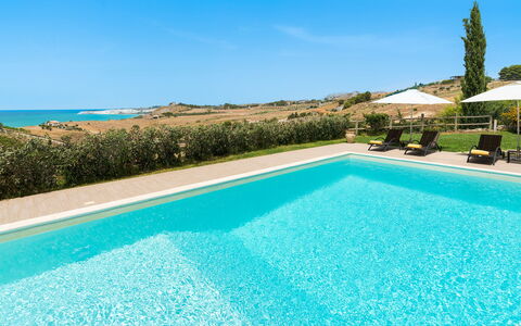 Villa Vistamare - Montallegro, Sicilia: Water, Sky, Plant, Property, Swimming Pool, Azure, Blue, Building, Rectangle, Grass