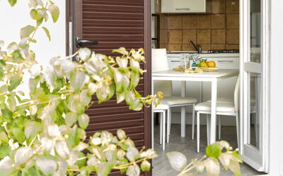 Golfo Aranci 150: Flower, Plant, Table, Wood, Yellow, Building, Chair, Petal, House, Tap