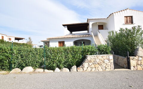 Luisa Apartment In Budoni, Shared Pool: Residential Area, Home, Roof, Estate, Landscaping, Villa, Shade, Balcony, Hacienda, Driveway