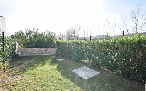 Luisa Apartment In Budoni, Shared Pool: Shrub, Garden, Fence, Hedge, Landscaping, Home Fencing, Backyard, Lawn, Yard, Shade