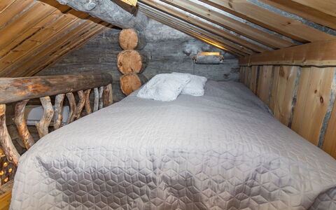 Villa Saaruakuja 3 As.1: Wood, Bedroom, Linens, Floor, Bedding, Bed Sheet, Ceiling, Attic, Bed, Hardwood