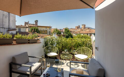Lucca Old Town Apartment - Lucca, Toscana: Wall, Home, Furniture, Apartment, Balcony, Chair, Houseplant, Outdoor Furniture, Flowerpot, Coffee Table
