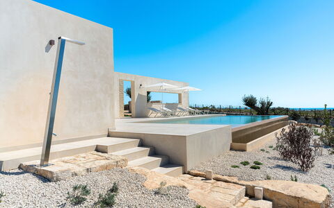 Villa Argento - Rosolini, Sicilia: Sky, Plant, Shade, Composite Material, Facade, Landscape, Concrete, Rock, Urban Design, Tree