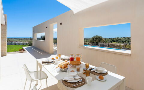 Villa Argento - Rosolini, Sicilia: Table, Furniture, Property, Sky, Tableware, Food, Building, Chair, Shade, Window