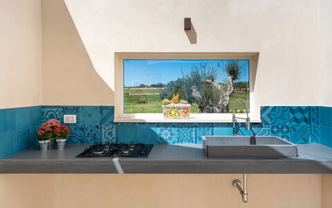 Villa Argento - Rosolini, Sicilia: Plant, Cabinetry, Countertop, Azure, Houseplant, Building, Interior Design, Table, Shade, Tap