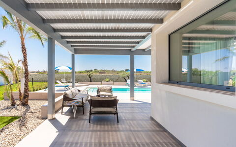Casa Colori - Noto, Sicilia: Plant, Property, Table, Interior Design, Shade, Building, Condominium, Residential Area, Chair, Sky