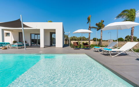 Villa Le Palme - Noto, Sicilia: Water, Sky, Property, Plant, Swimming Pool, Azure, Blue, Building, Outdoor Furniture, Shade