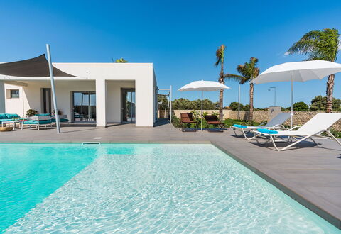 Villa Le Palme - Noto, Sicilia: Water, Sky, Property, Plant, Swimming Pool, Azure, Blue, Building, Outdoor Furniture, Shade