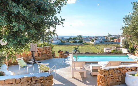 Villa Trullo - Torricella, Puglia: Water, Plant, Sky, Furniture, Cloud, Table, Chair, Swimming Pool, Outdoor Furniture, Leisure