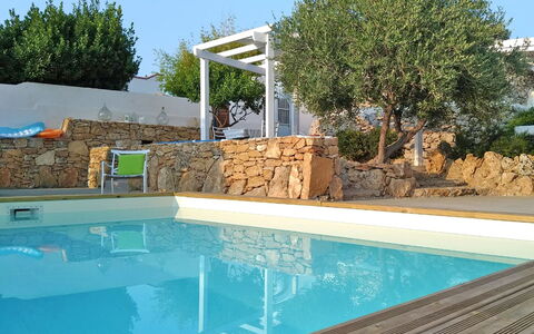 Villa Trullo - Torricella, Puglia: Water, Plant, Sky, Property, Swimming Pool, Azure, Tree, Shade, Outdoor Furniture, Leisure