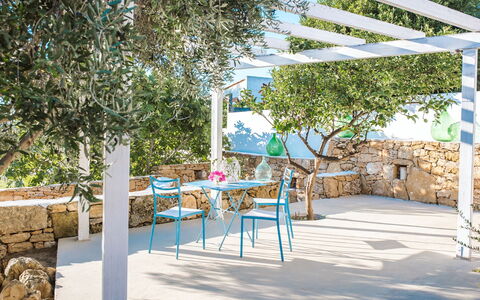 Villa Trullo - Torricella, Puglia: Plant, Table, Shade, Chair, Outdoor Furniture, Outdoor Table, Urban Design, Tree, Wood, Road Surface