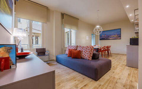 Lucy Florence Charming Modern Apartment Near Piazz: Furniture, Property, Couch, Table, Window, Wood, Orange, Comfort, Building, Interior Design