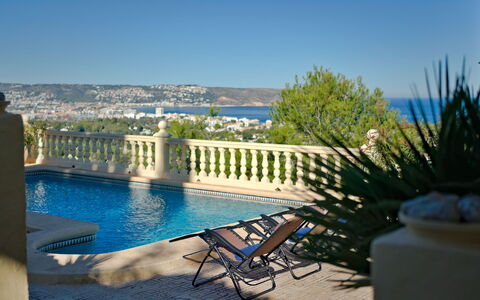Villa Zamorita: Water, Sky, Plant, Blue, Building, Azure, Outdoor Furniture, Swimming Pool, Leisure, House