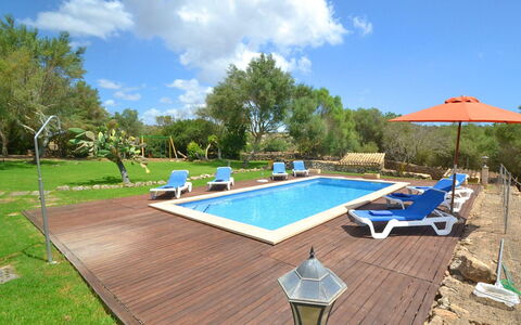 Mascaro: Sky, Cloud, Swimming Pool, Plant, Outdoor Furniture, Tree, Shade, Building, Wood, Sunlounger