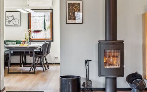 Janna - 1.4Km from the Sea: Flooring, Interior Design, Floor, Home, Flowerpot, Furniture, Wood Flooring, Living Room, Wood-Burning Stove, Houseplant