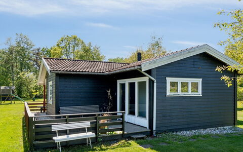Janna - 1.4Km from the Sea: Cottage, House, Siding, Home, Garden Buildings, Porch, Shed, Lawn, Yard, Log Cabin