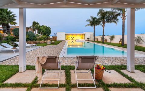 Casa Ocra - Misiliscemi, Sicilia: Plant, Water, Sky, Building, Property, Azure, Tree, Swimming Pool, Outdoor Furniture, Shade