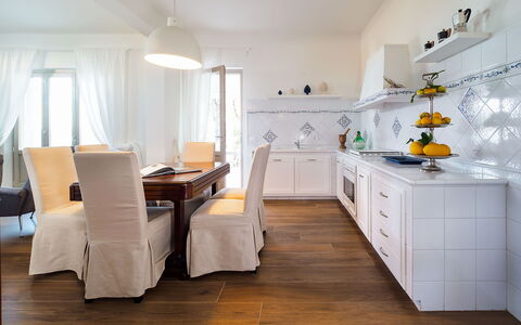 Casa Ocra - Misiliscemi, Sicilia: Cabinetry, Countertop, Table, Wood, Interior Design, Kitchen, Chair, Flooring, Floor, Drawer