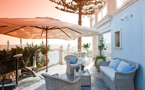 Villa Amena - Siracusa, Sicilia: Furniture, Plant, Blue, Window, Water, Shade, Outdoor Furniture, Chair, Lighting, Interior Design