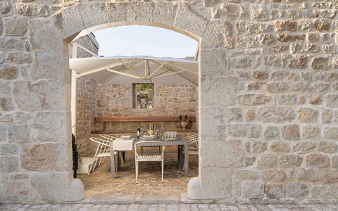Casa Masseria - Scicli, Sicilia: Table, Window, Plant, Chair, Building, Houseplant, Flowerpot, Interior Design, Outdoor Furniture, Flooring