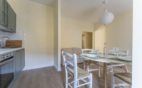 Spacious Apartment In Sori With Large Terrace - So: Property, Furniture, Table, Wood, Chair, Building, Lighting, Interior Design, Flooring, Floor
