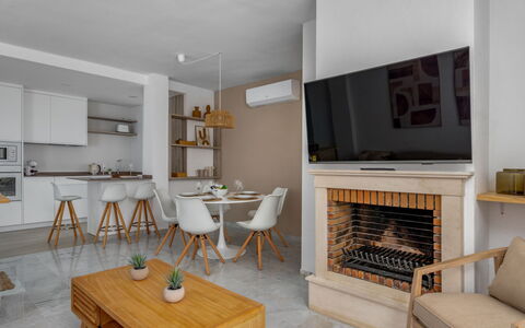 Ático Los Pelicanos: Property, Furniture, Wood, Table, Interior Design, Floor, Flooring, Chair, Hardwood