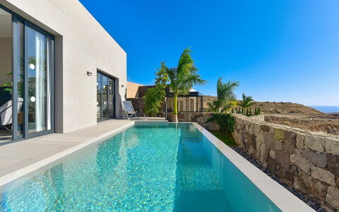 Yucas 12: Water, Plant, Sky, Property, Azure, Swimming Pool, Building, Blue, Tree, Leisure
