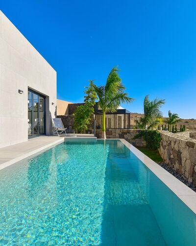 Yucas 12: Water, Plant, Sky, Property, Azure, Swimming Pool, Building, Blue, Tree, Leisure