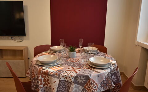Pirelli Central Station Apartment: Table, Furniture, Property, Tableware, Dishware, Tablecloth, Chair, Television, Interior Design, Plate