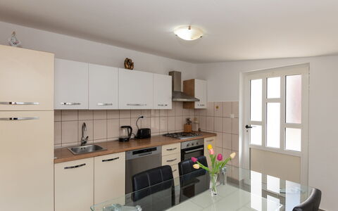 Lucija: Furniture, Kitchen, Kitchen Appliance, Countertop, Interior Design, Cabinetry, Flooring, Major Appliance, Wood, Ceiling